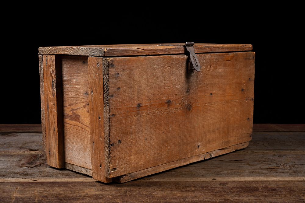 Lot 35: Rustic Wooden Chest with Iron Latches