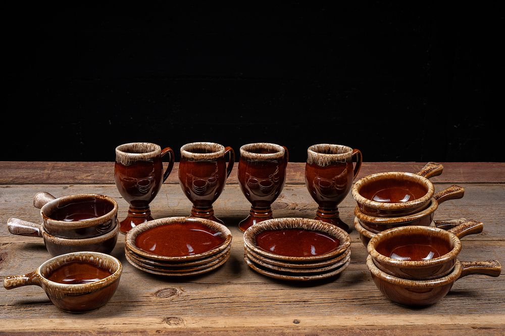Lot 38: Lot of 20 Hull Brown Drip Stoneware Dinnerware