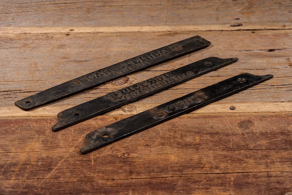 Lot 90: Set of Three Antique Cast Iron Stove Name Plates