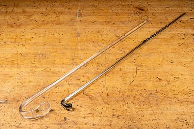 Lot of Two Hand Blown Glass Canes. C-21995 Lot of two hooked glass canes; straight cane has 
