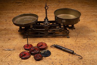Cast Iron Balance Scale and Weights. C-22099 Cast iron tabletop balance scale with two brass 