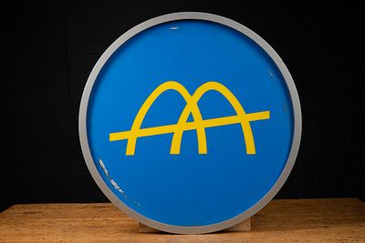 McDonald's Golden Arches Round Sign, c. 1970s. C-22145 Round blue vinyl sign face with yellow 