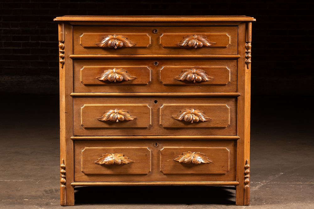 Lot 313: Eastlake Walnut Four Drawer Chest