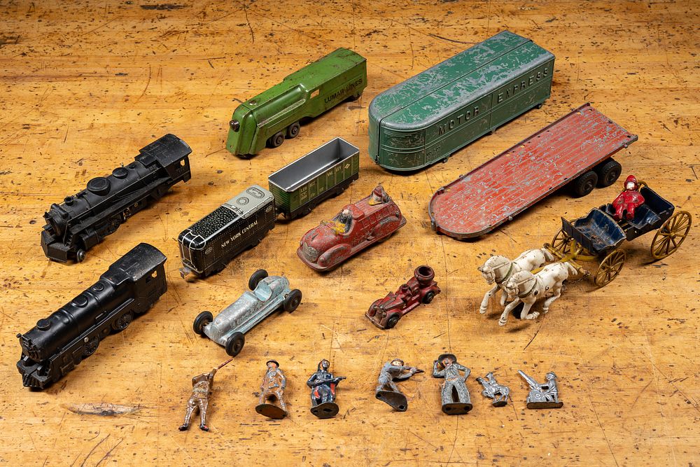 Lot 50: Mixed Lot of Toy Vehicles and Figures, circa 1930s
