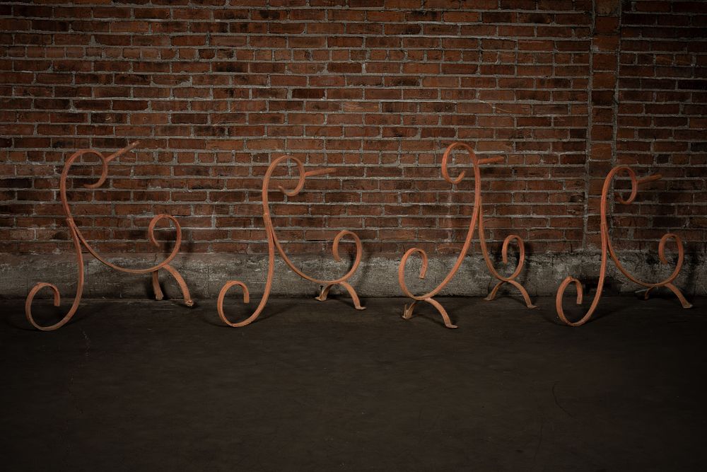 Lot 132: Four Wrought Iron Scrollwork Sign Brackets