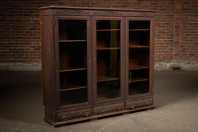 Carved Oak Three Door Glass Bookcase Cabinet. C-22558 Carved oak bookcase cabinet with three 