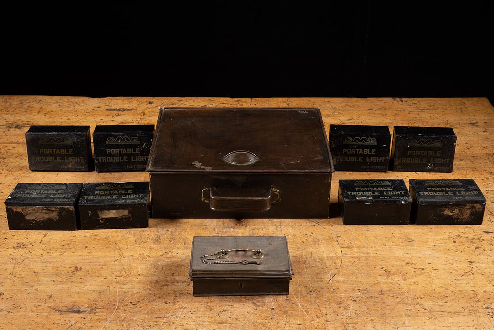 Lot 323: Vintage GMC Portable Trouble Light Tin Box Lot