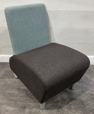 * A Contemporary Two-Tone Upholstered Armless Lounge Chair. This contemporary armless lounge 