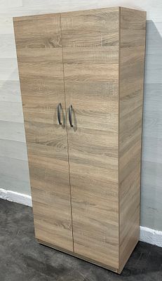 * A modern two-door wardrobe in light oak-effect finish. A contemporary two-door wardrobe 