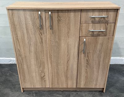 * A contemporary light oak-effect three-door storage cupboard with two drawers. A contemporary 