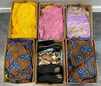 * 6 cartons containing assorted clothing, textiles and footwear. A varied collection of 
