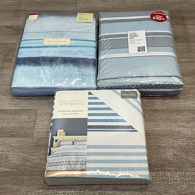 * A Carton Containing Three Bedding Sets including RJR John Rocha and Ports of Call by Jeff Banks. 