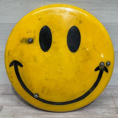 * James Cauty Smiley Style Riot Shield by Levette Design. A large circular novelty riot shield 