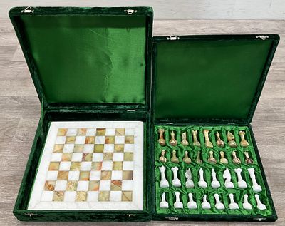 * A Vintage Hand-Carved Chess Set in Fitted Presentation Cases. This set comprises a polished 