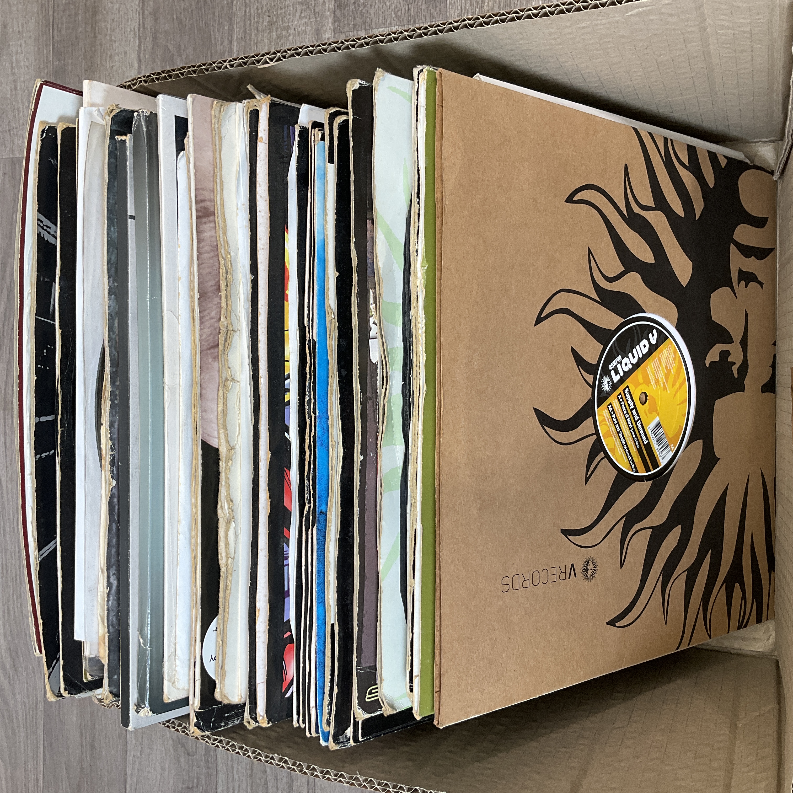 * A Carton Containing a Collection of Drum & Bass and Jungle 12-inch Vinyl Records
