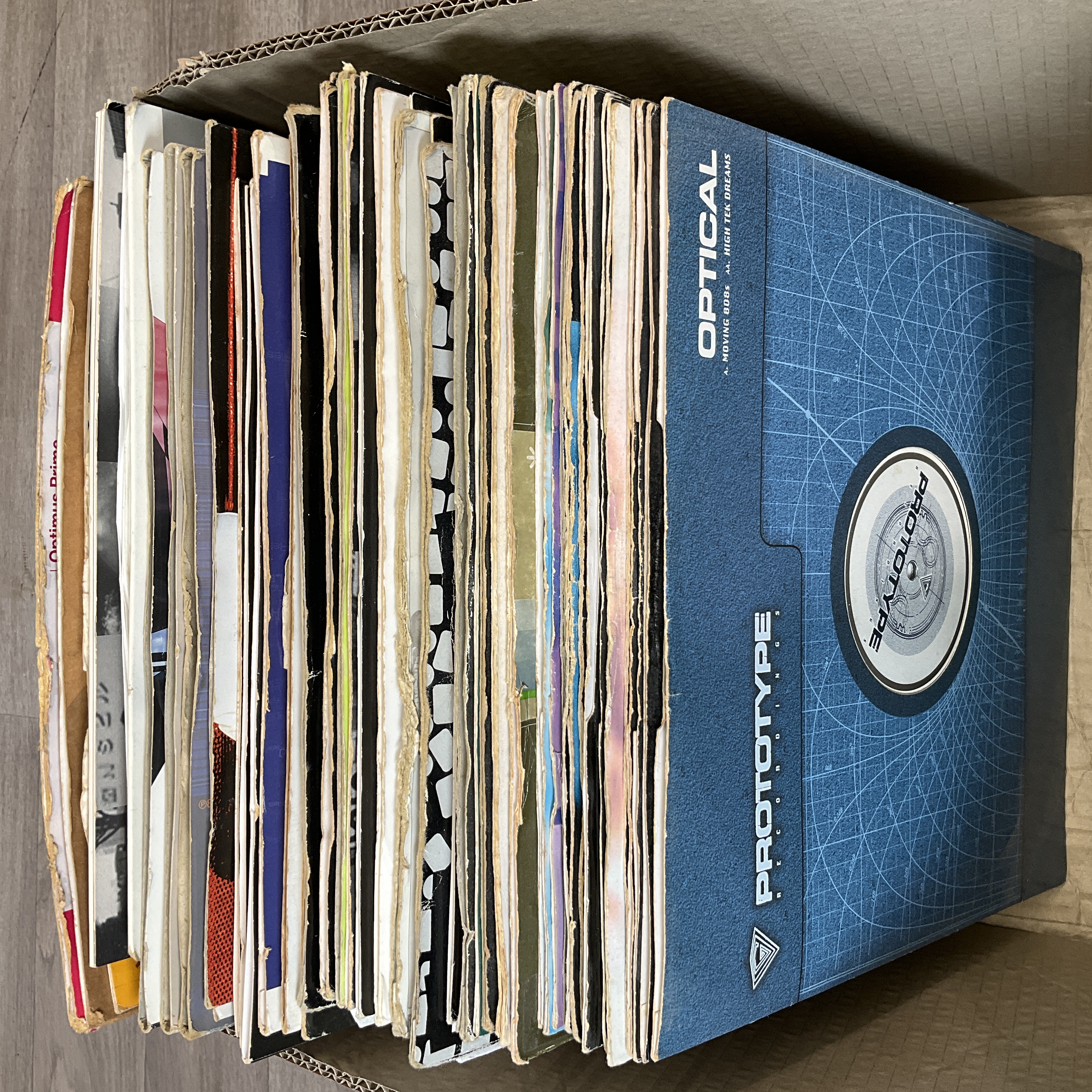 * A carton containing a collection of UK Drum and Bass and Jungle twelve inch vinyl records