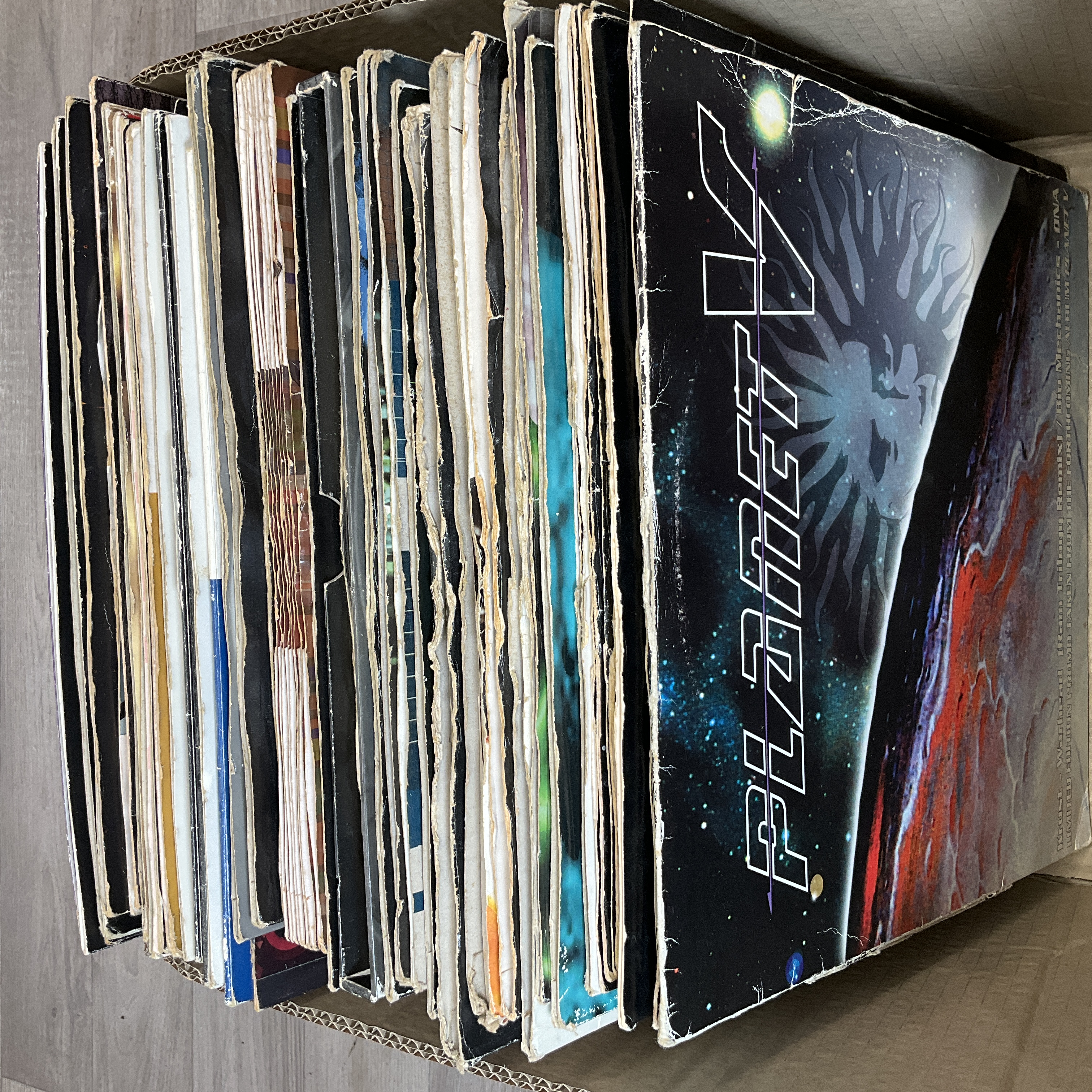 * A Carton Containing Assorted 12 Inch Drum and Bass Vinyl Records