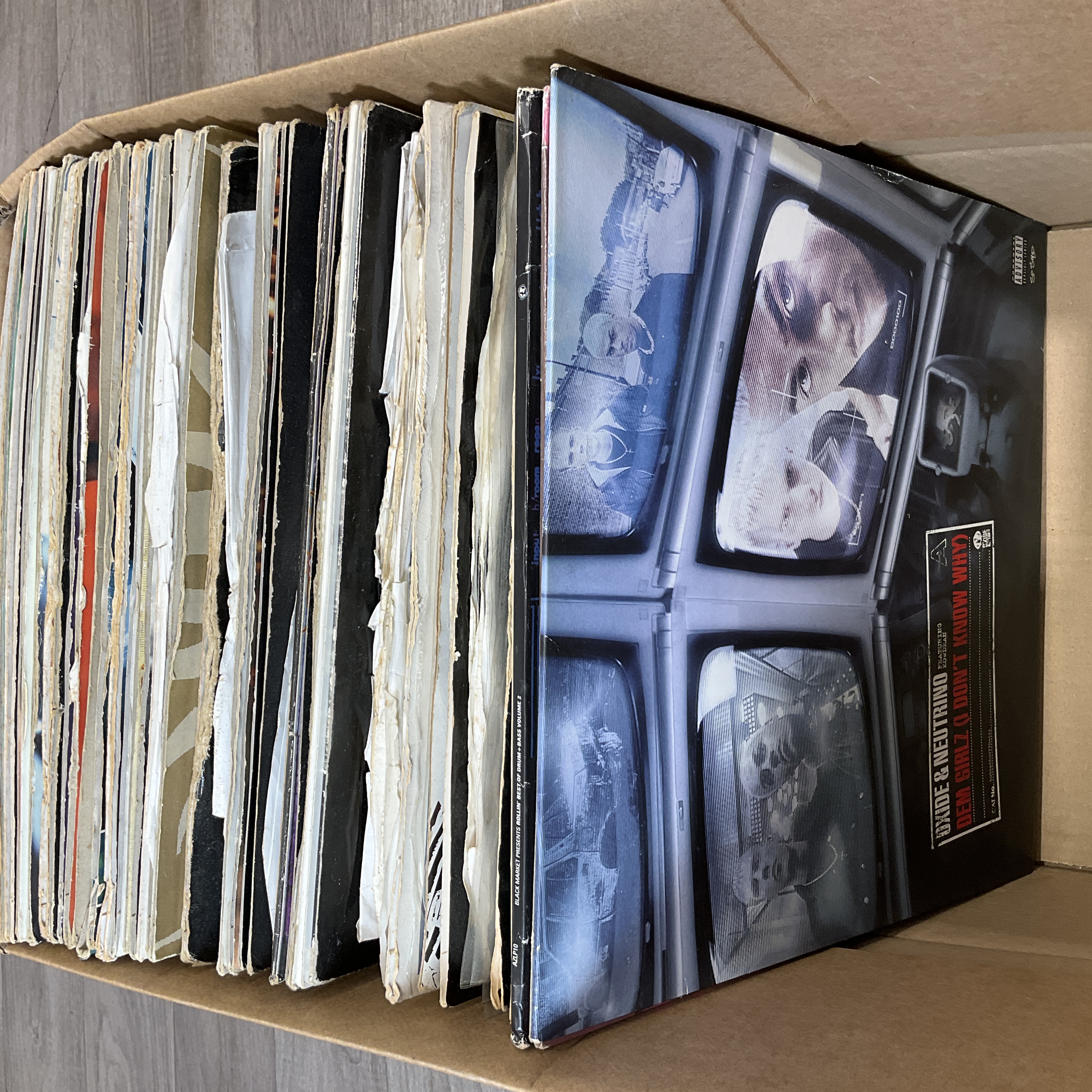 * A carton containing a collection of Drum and Bass and Jungle 12 inch vinyl records