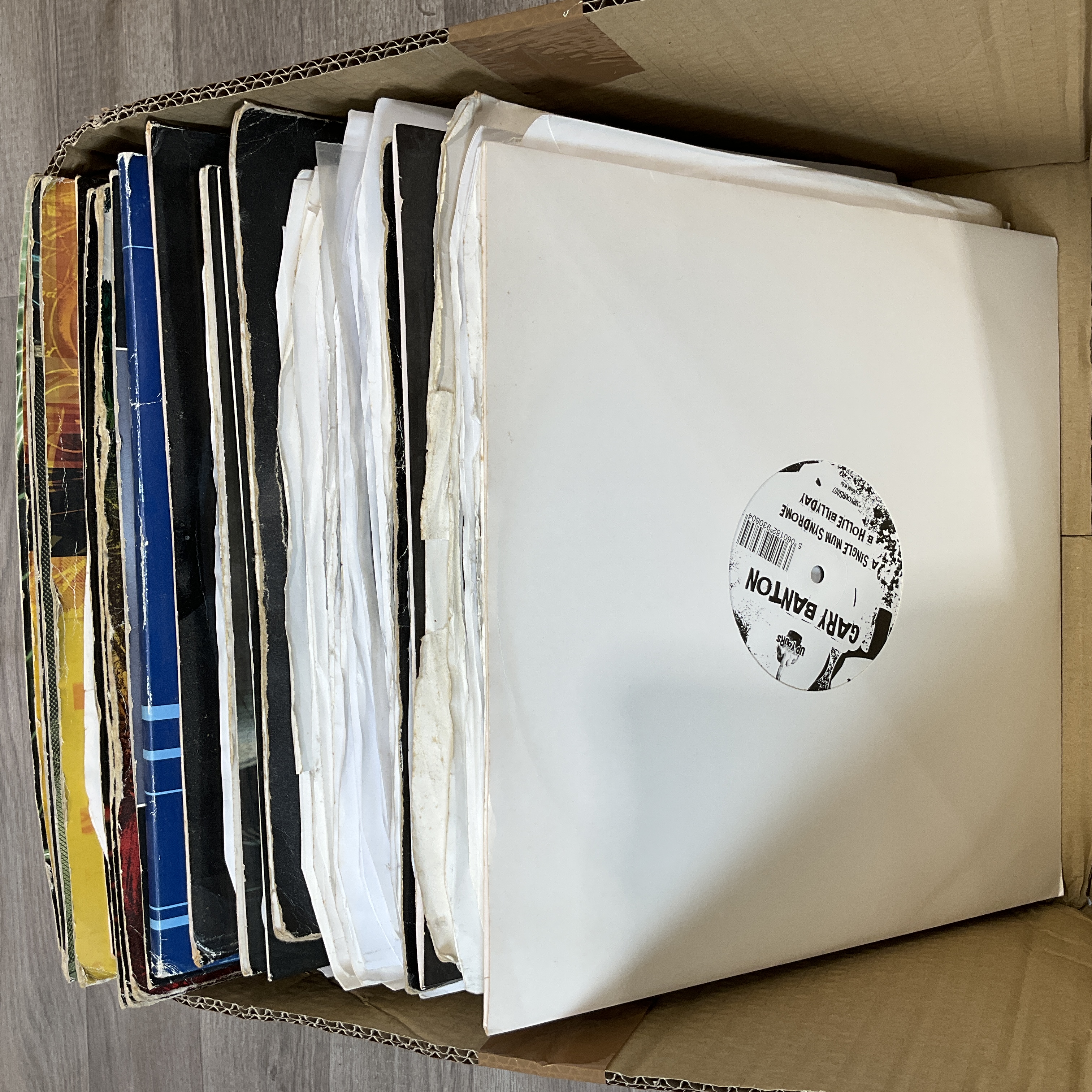 * A Carton Containing a Collection of Drum and Bass Twelve Inch Vinyl Singles and EPs