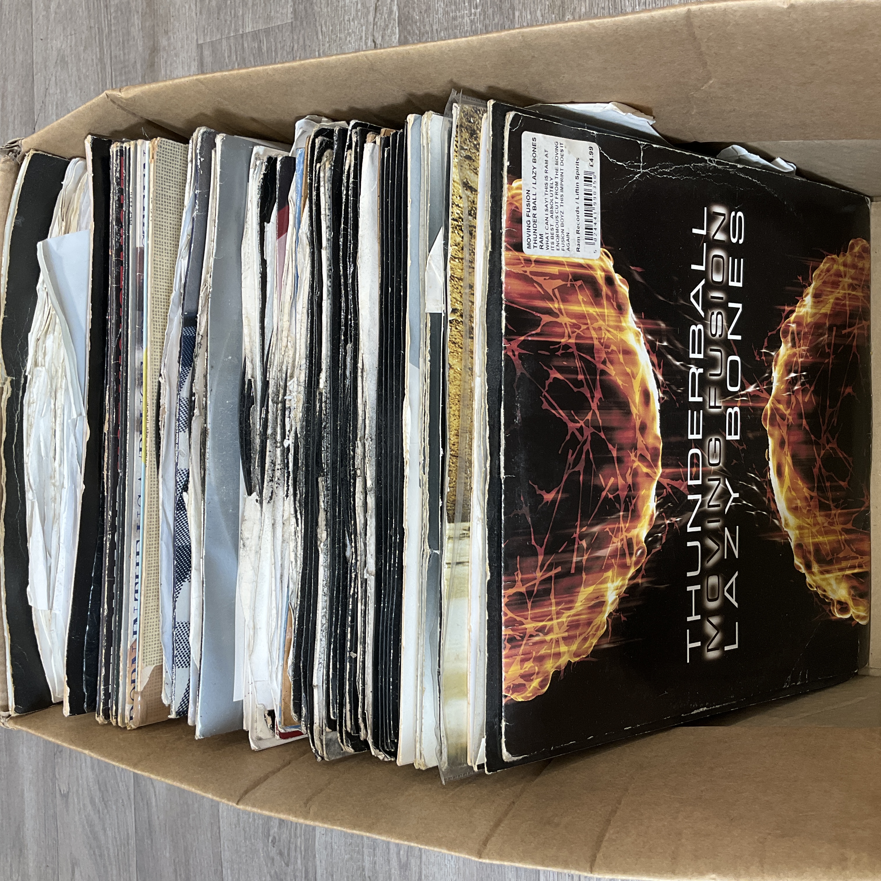 * A Carton Containing a Collection of Assorted Drum and Bass and Jungle Vinyl Records Including White Labels and a Dubplate