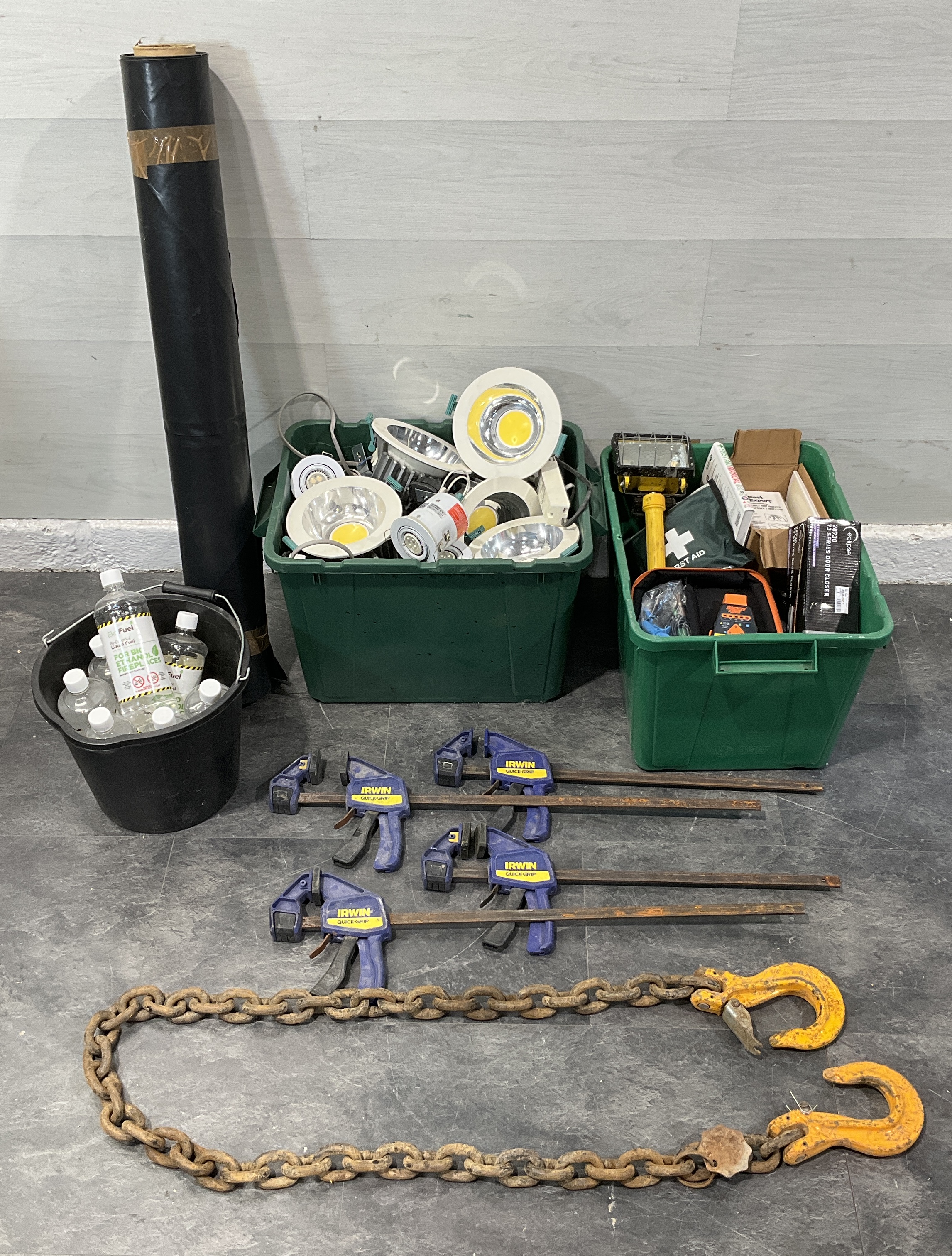 A Collection of Workshop Tools, Industrial Lighting Fixtures, Electrical Testing Equipment, and Building Maintenance Supplies Including 2 Crates & A Bucket
