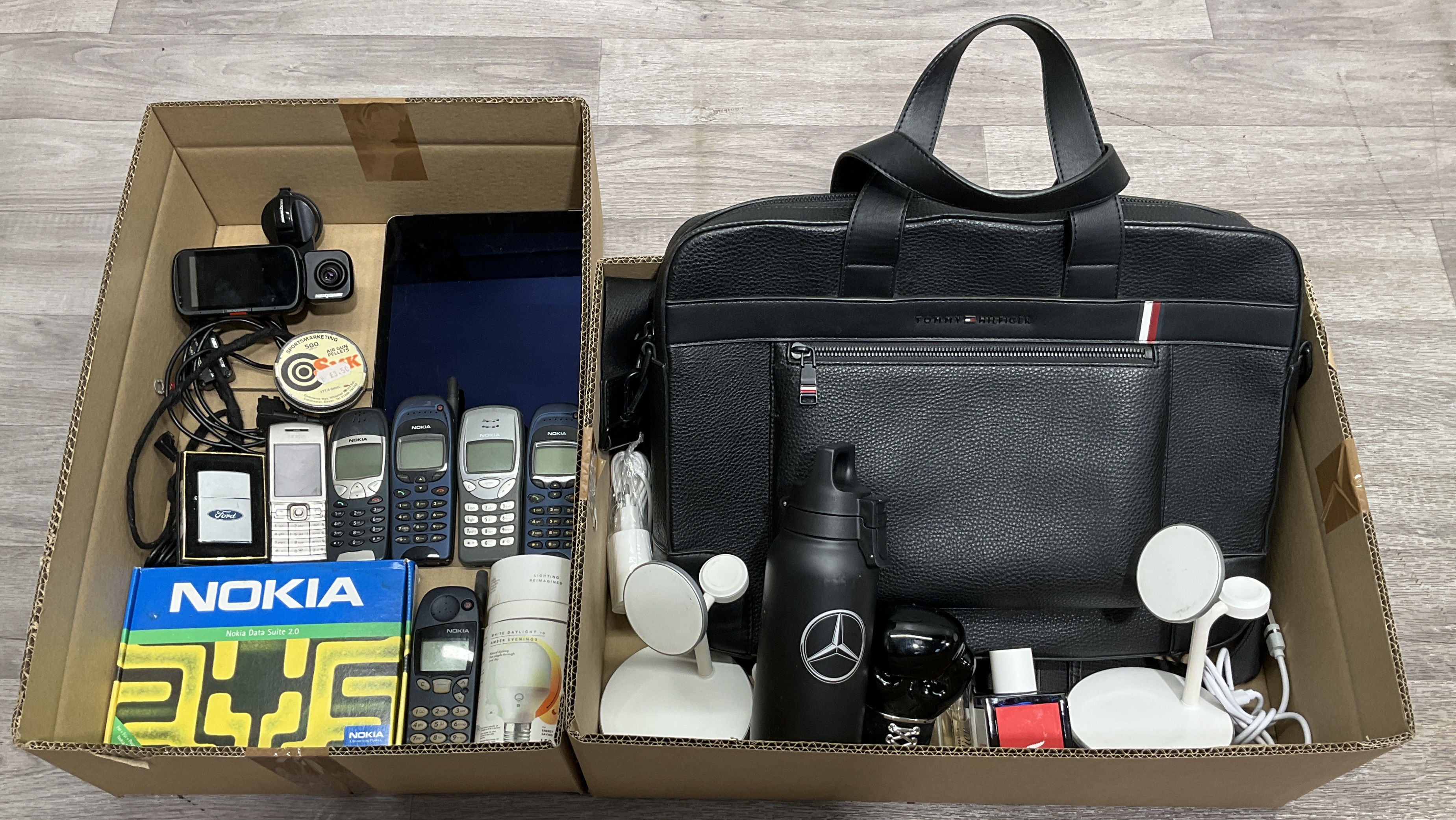 2 Cartons Containing An Assortment of Consumer Electronics, Designer Accessories, and Automotive Related Items