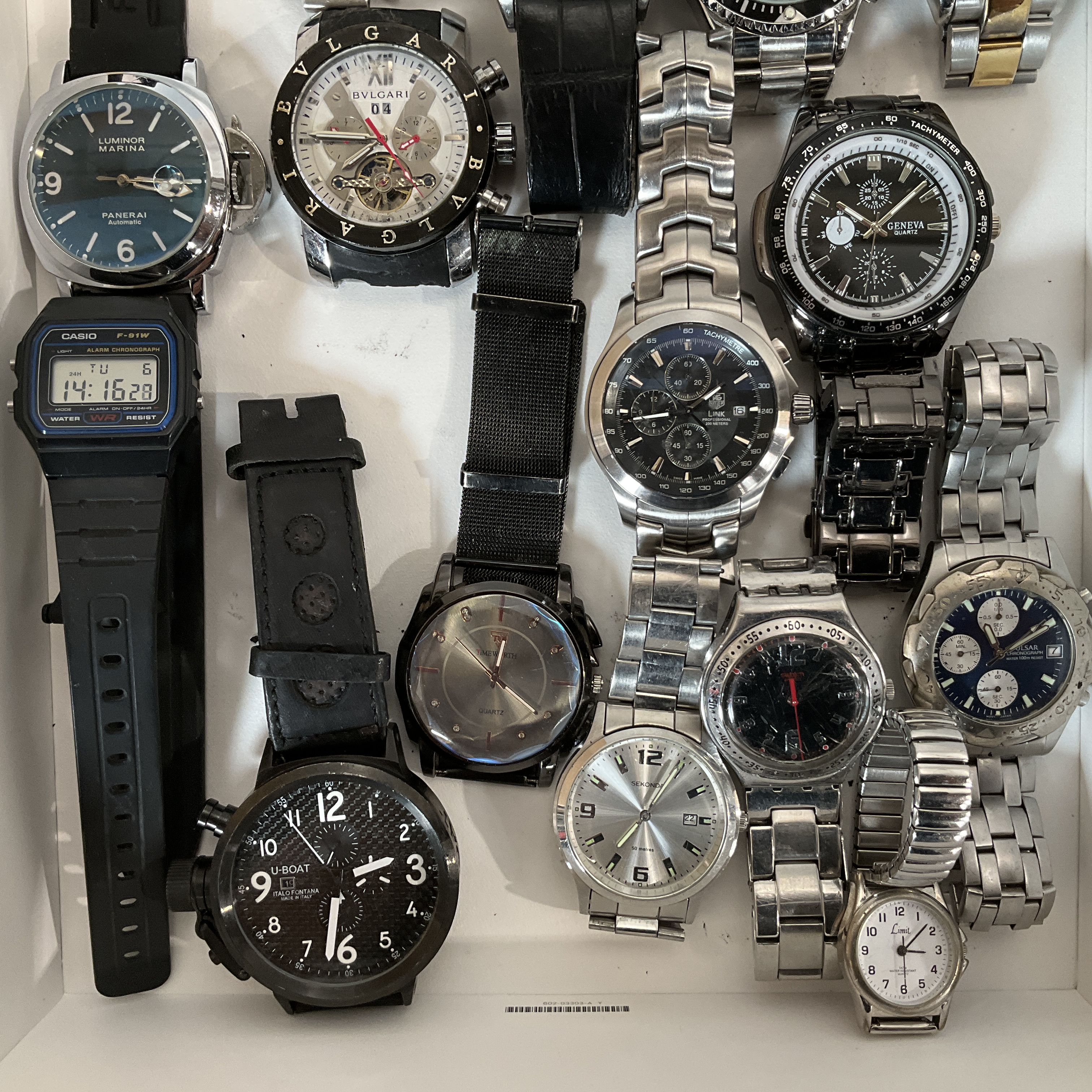 * A tray containing a collection of assorted wristwatches
