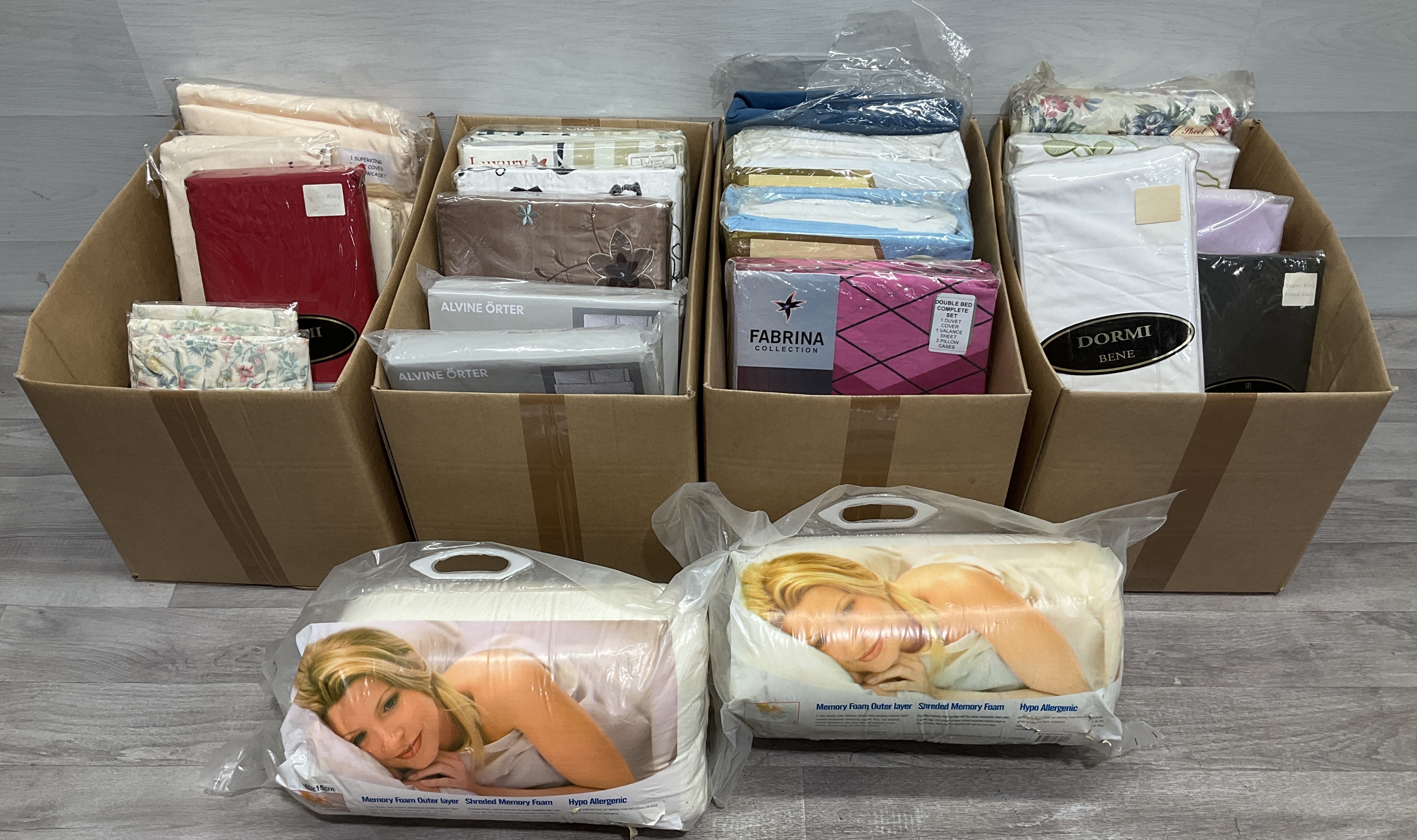 * 4 Cartons Containing an Assortment of Packaged Branded Bed Linens and Memory Foam Pillows