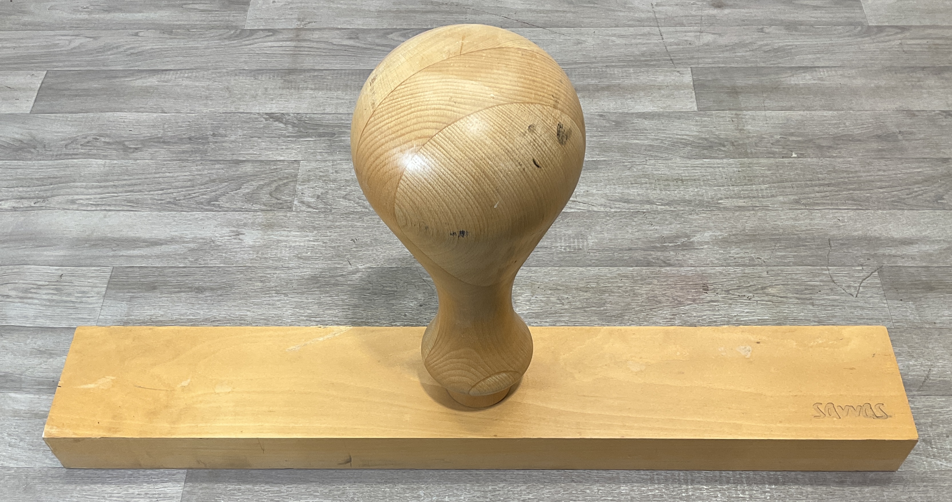 * A Savvas Professional Laminated Wood Millinery Hat Block on Wooden Base