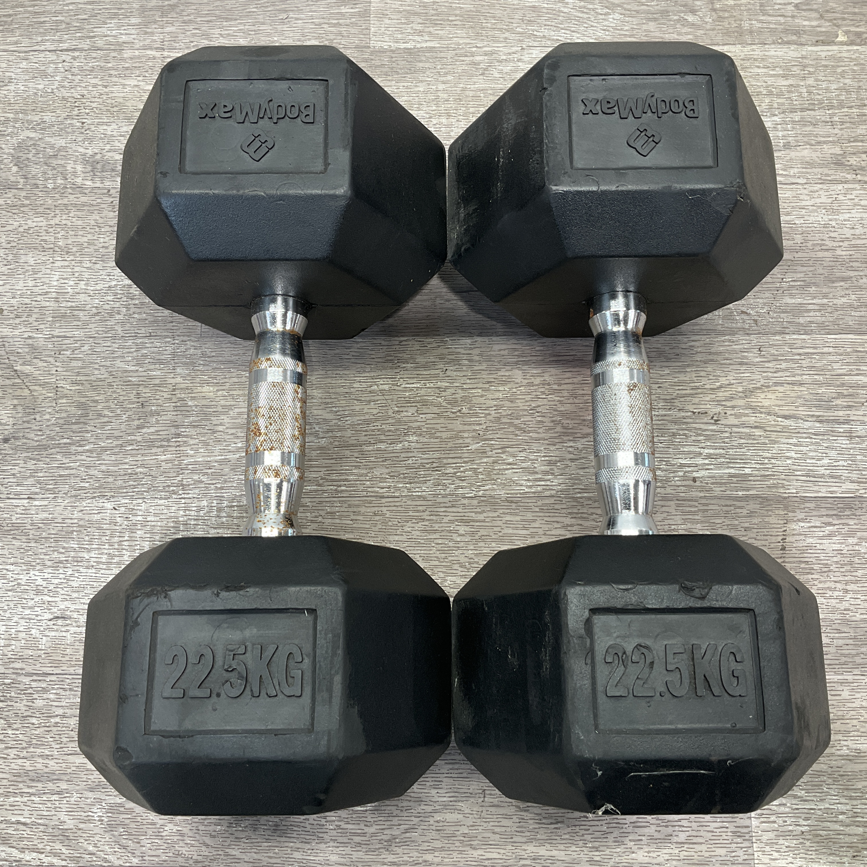 * A Pair of BodyMax 22.5kg Rubber Hexagonal Dumbbells