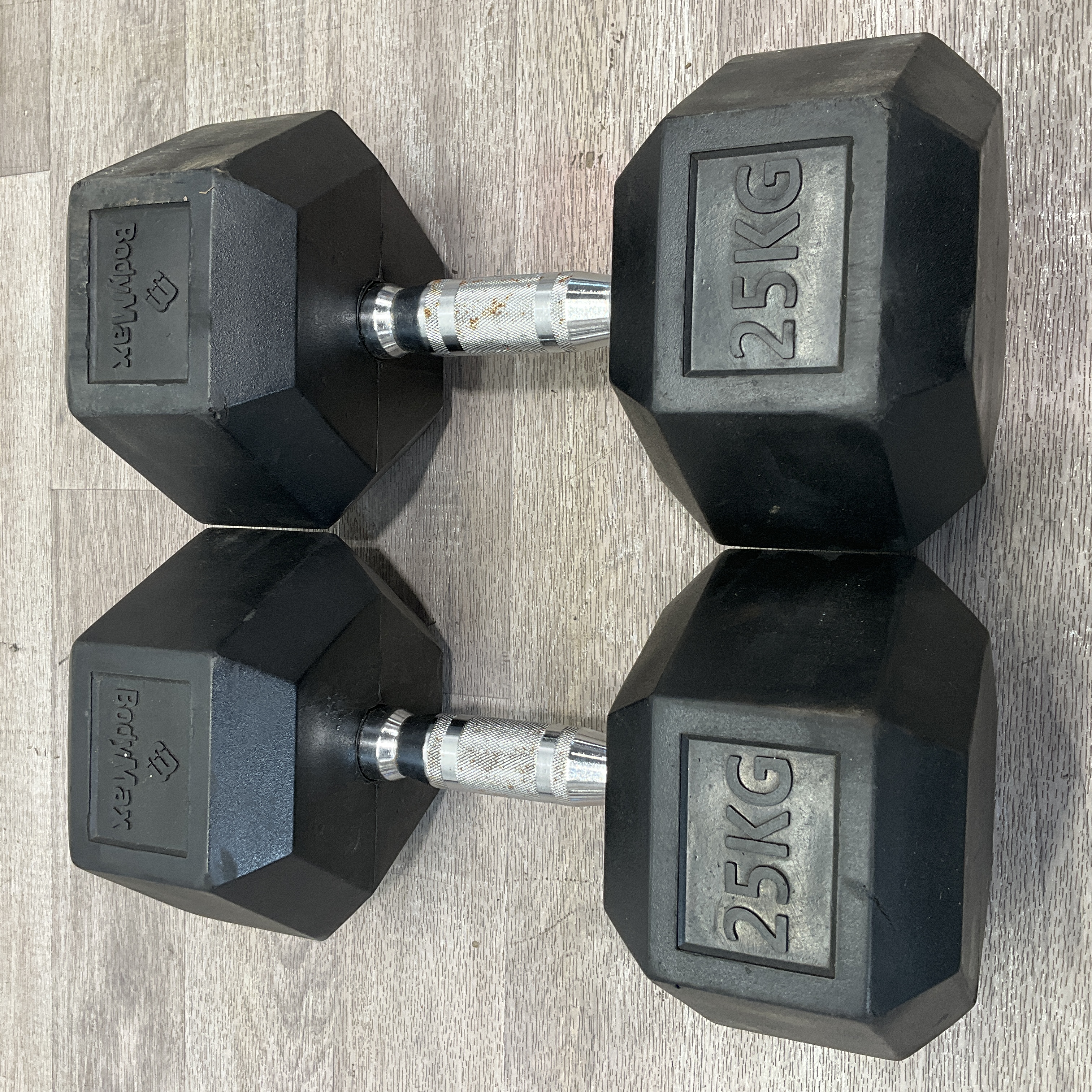 * A Pair of BodyMax 25kg Rubber Hexagonal Dumbbells