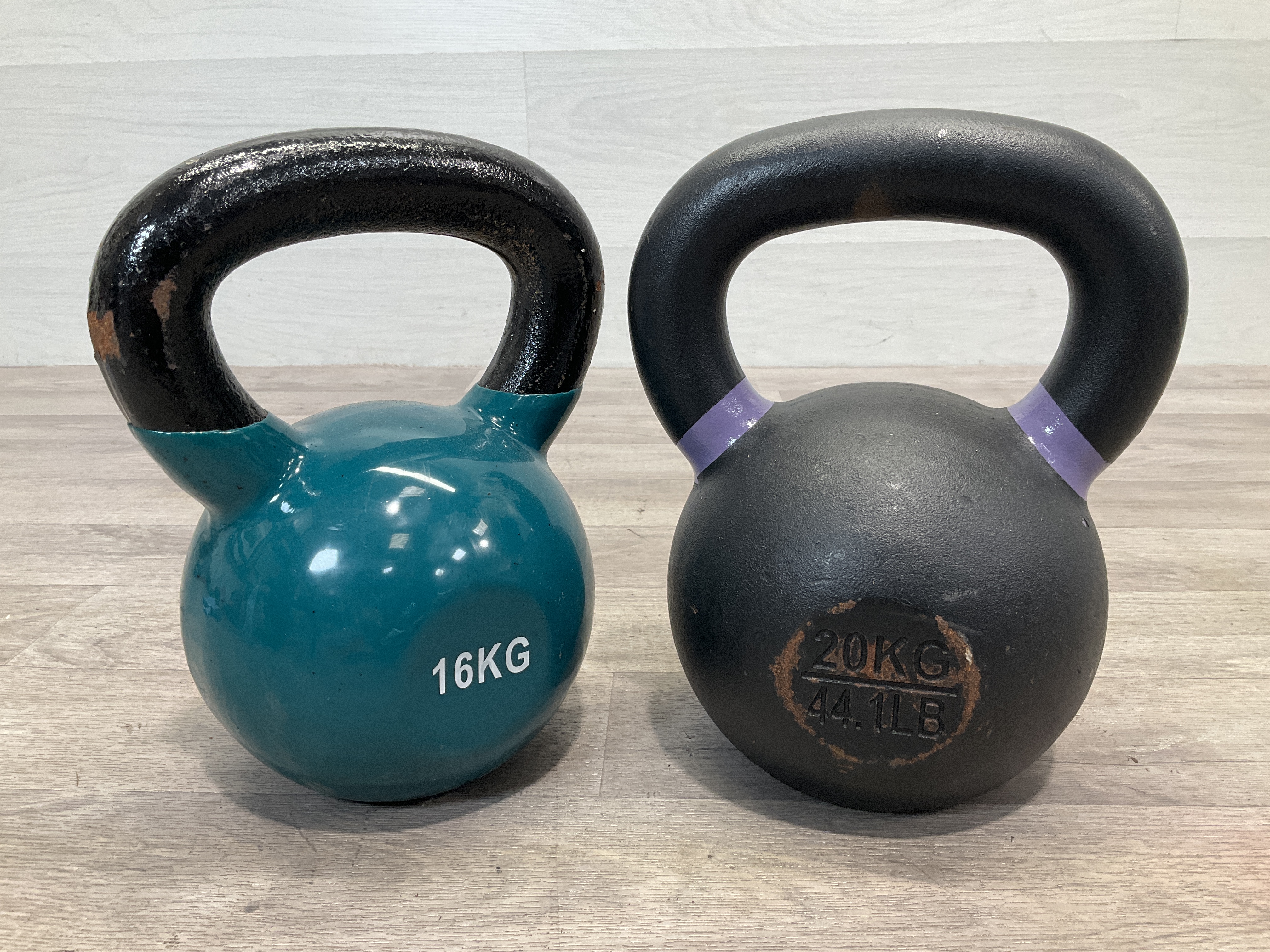 * Two Cast Iron Fitness Kettlebells, 16kg and 20kg TRX