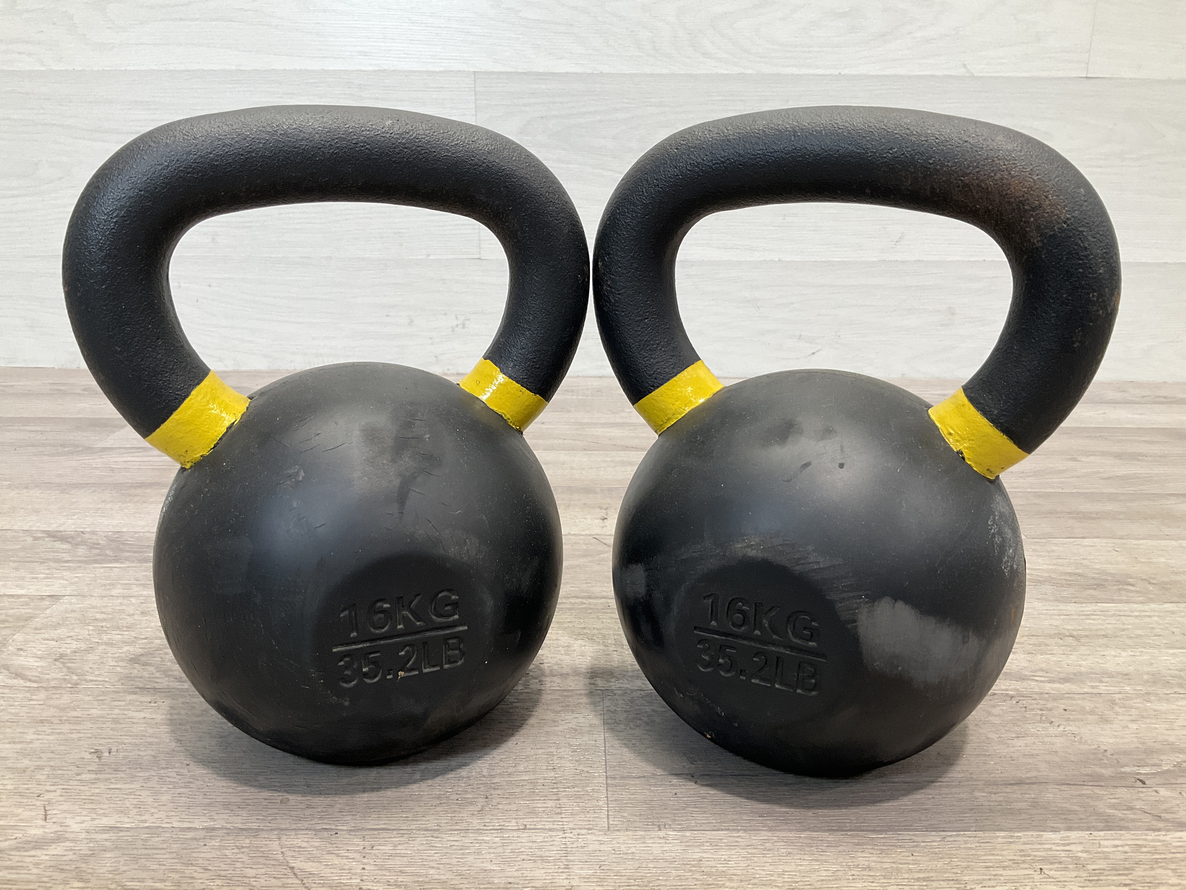 * A Pair of TRX Cast Iron 16kg Kettlebells