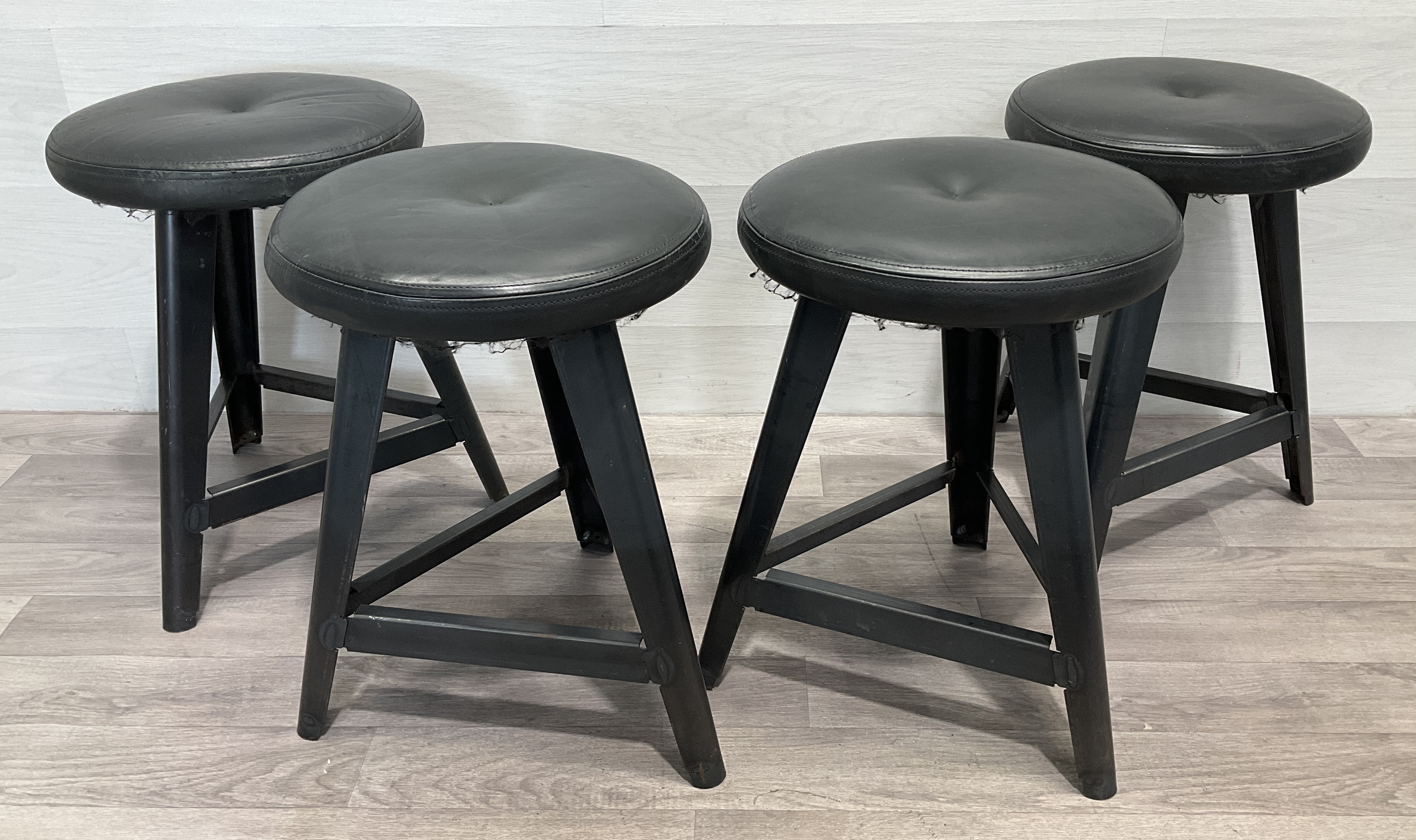 * A Set of Four Industrial Style Metal Framed Stools