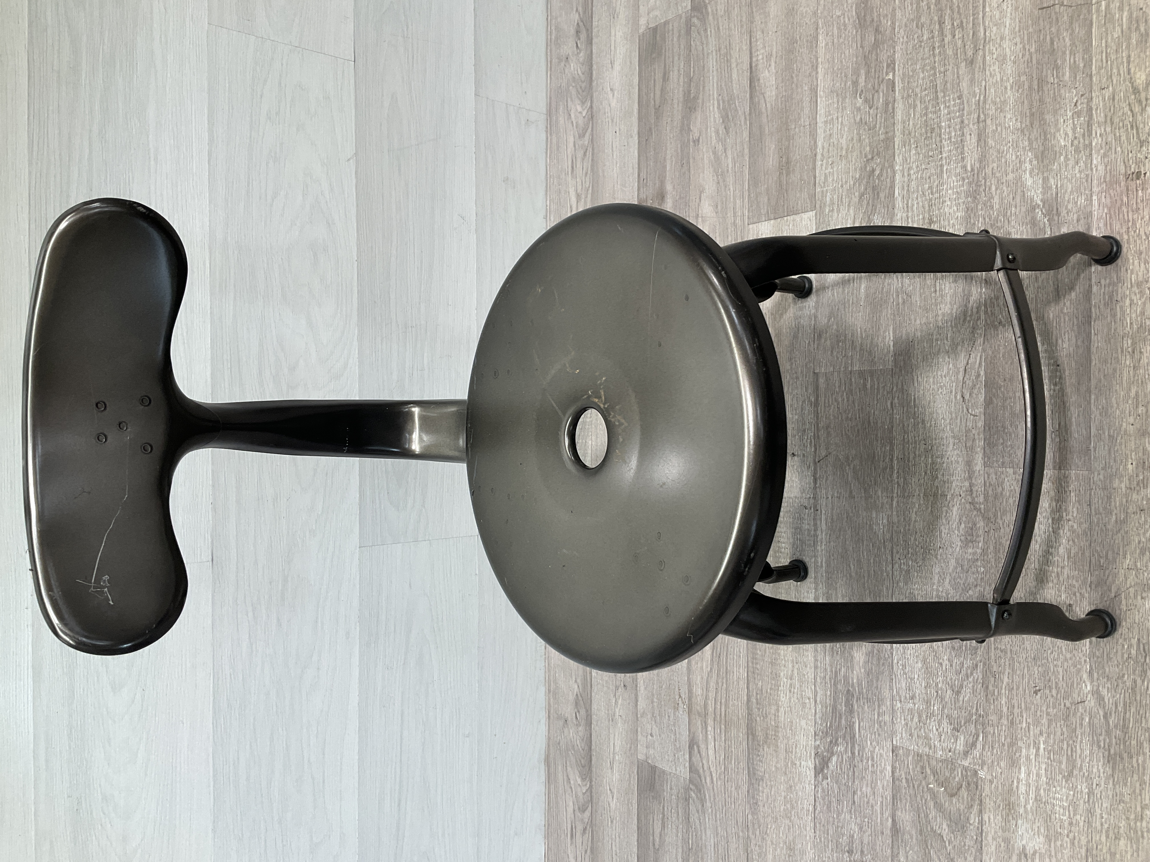 * A Nicolle Whale Tail Industrial Steel Chair