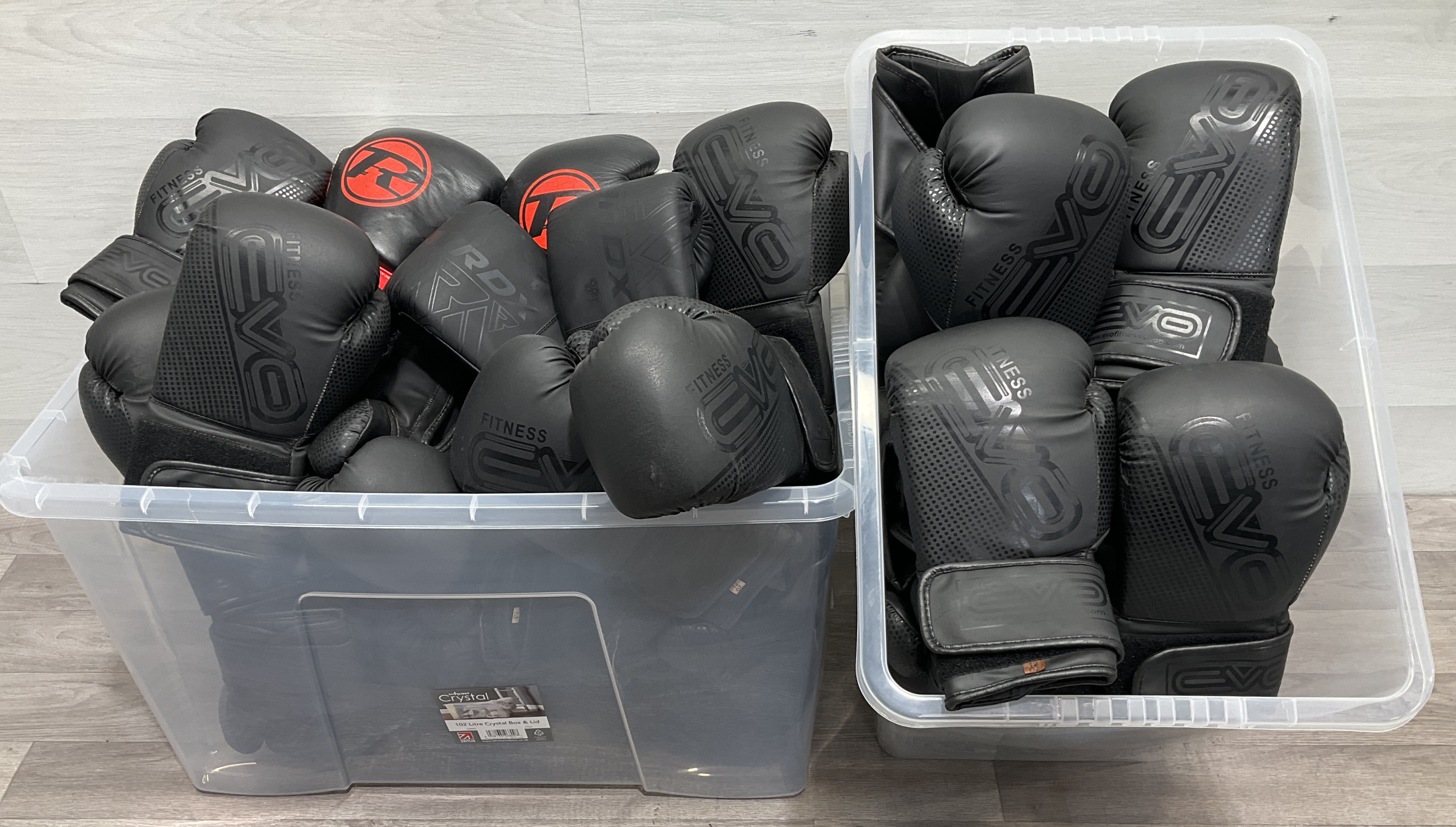 * 2 Crates Containing An Assortment of EVO Fitness and RDX Boxing and Training Gloves