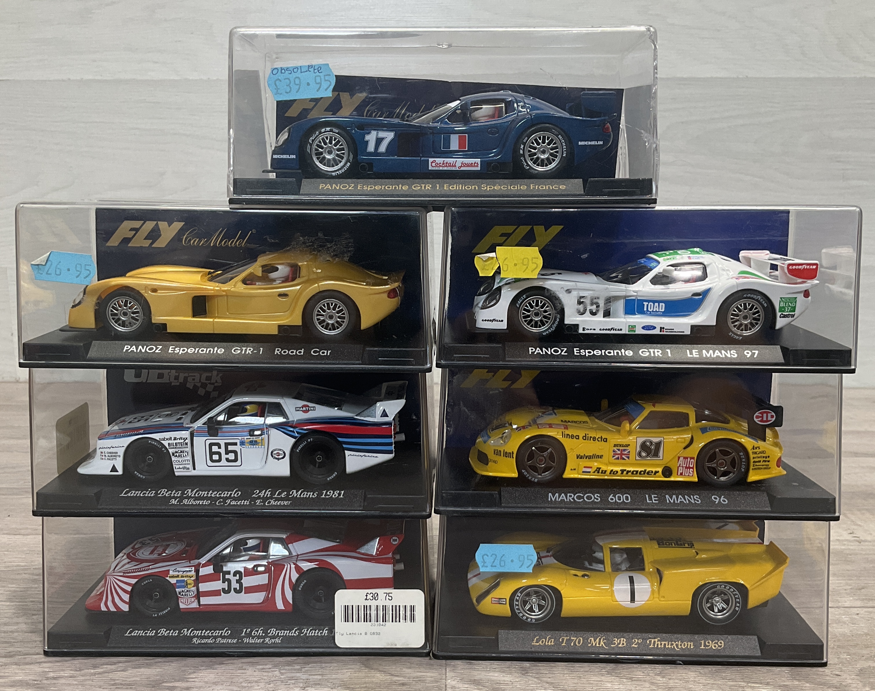 * A Carton Containing A Collection of Fly Car Model and GB Track 1:32 Scale Electric Slot Cars