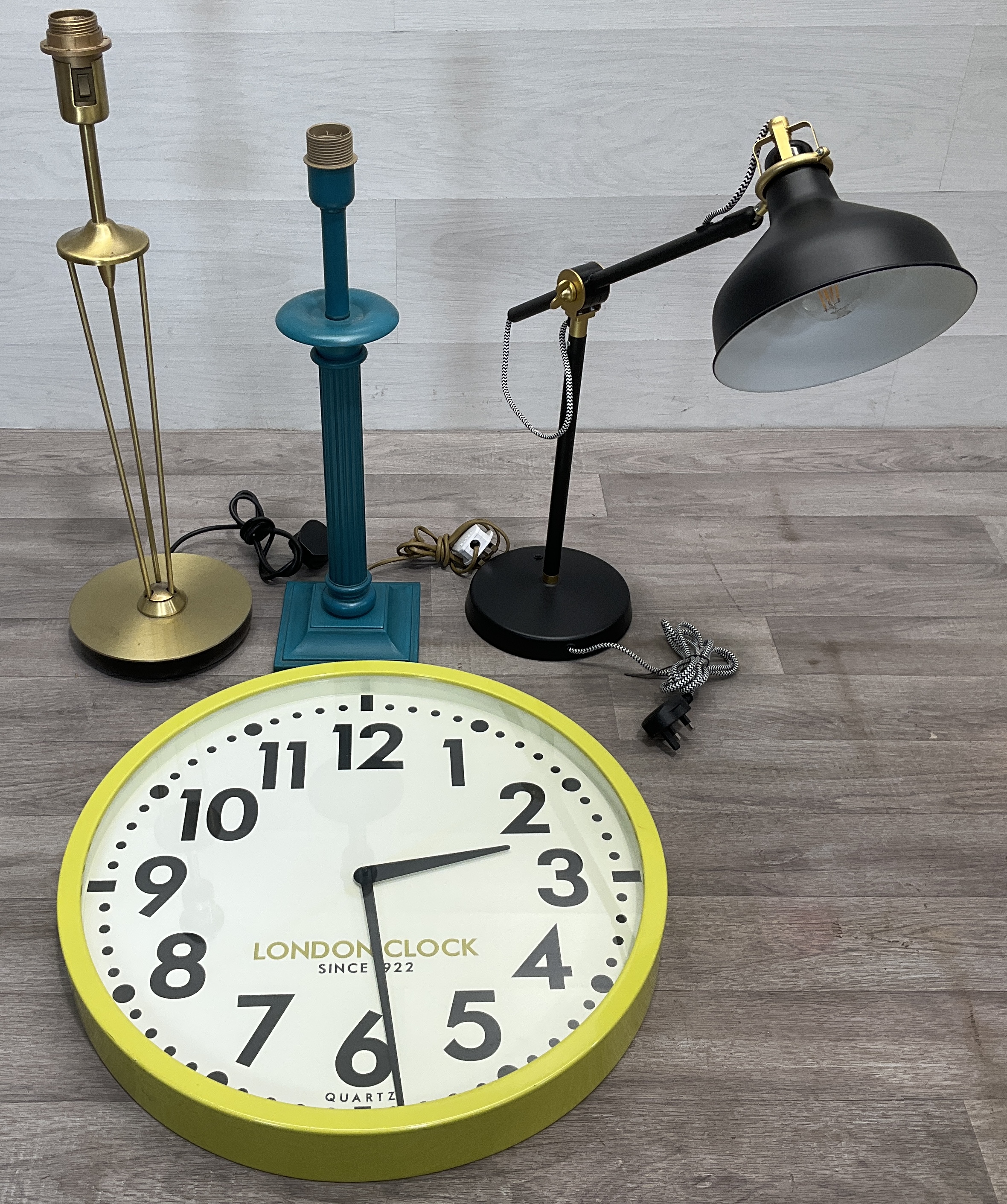 * An Assortment of Contemporary Table Lamp Bases and a London Clock Company Wall Clock
