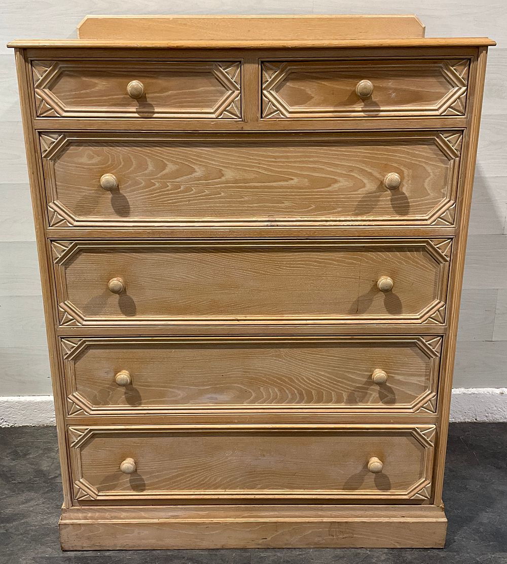 Lot 19: * A Two Over Four Chest of Drawers with Geometric Moulding