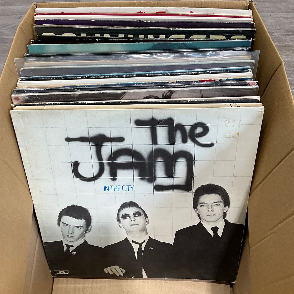 Lot 32: * A Carton Containing A Collection of Assorted Vinyl Records including The Jam In The City and Heaven 17 The Luxury Gap