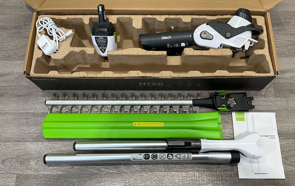 Lot 82: * Gtech HT50 Cordless Hedge Trimmer with Extension Poles, Battery and Charger