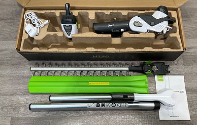 * Gtech HT50 Cordless Hedge Trimmer with Extension Poles, Battery and Charger. A Gtech HT50 