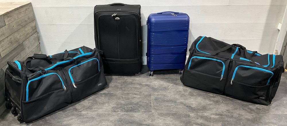 Lot 109: * An Assortment of Luggage including Starlite Luggage Rolling Duffel Bags and a Royal King Suitcase