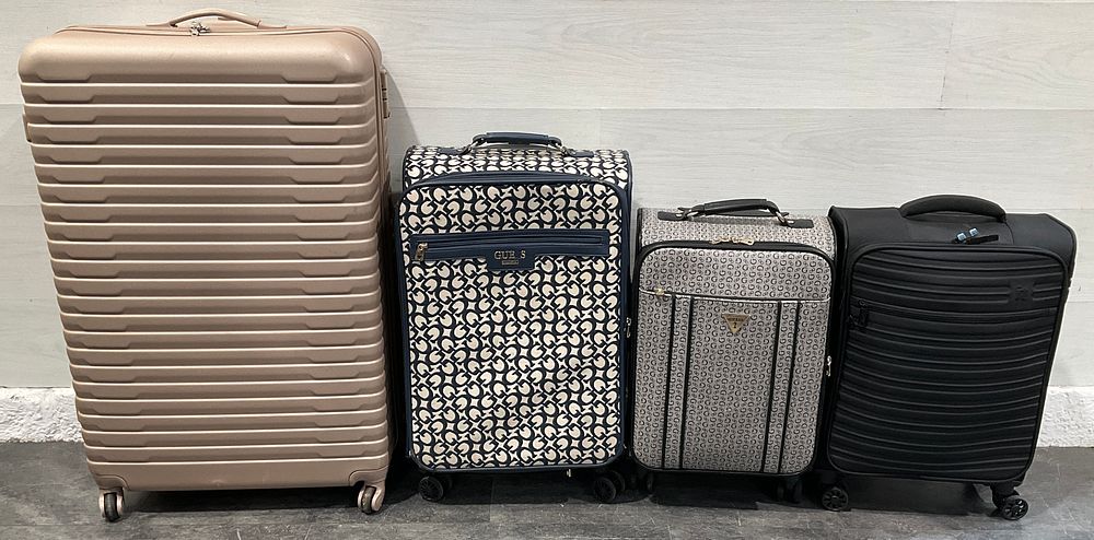 Lot 13: * An Assortment of Luggage including Guess and IT Luggage
