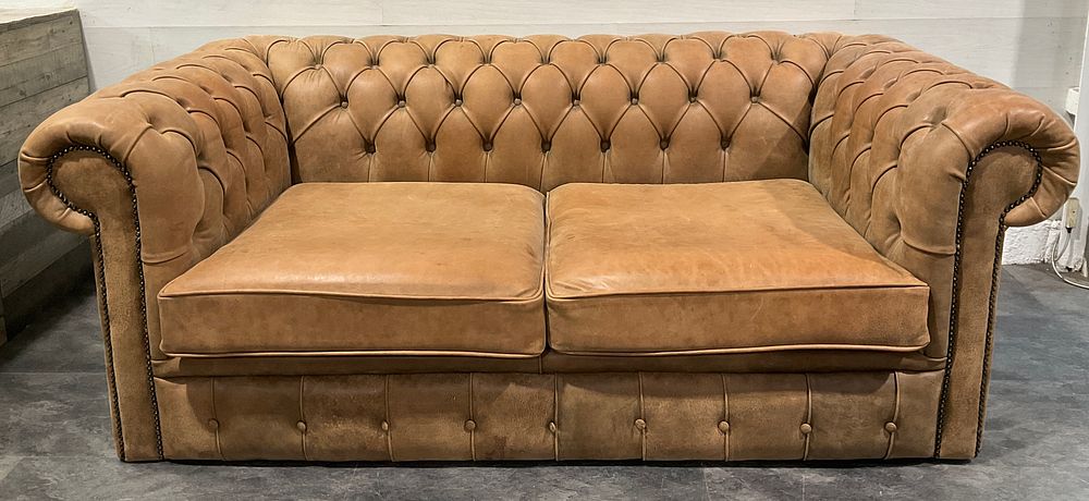 Lot 16: * Two Seat Chesterfield Sofa in Tan Leather
