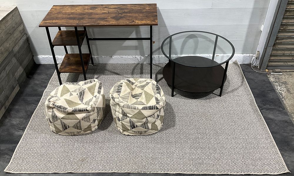 Lot 32: * An Assortment of Modern Household Goods including an Industrial Style Desk, Circular Coffee Table, A Pair of Geometric Bean Bags and an IKEA Lydersholm Rug