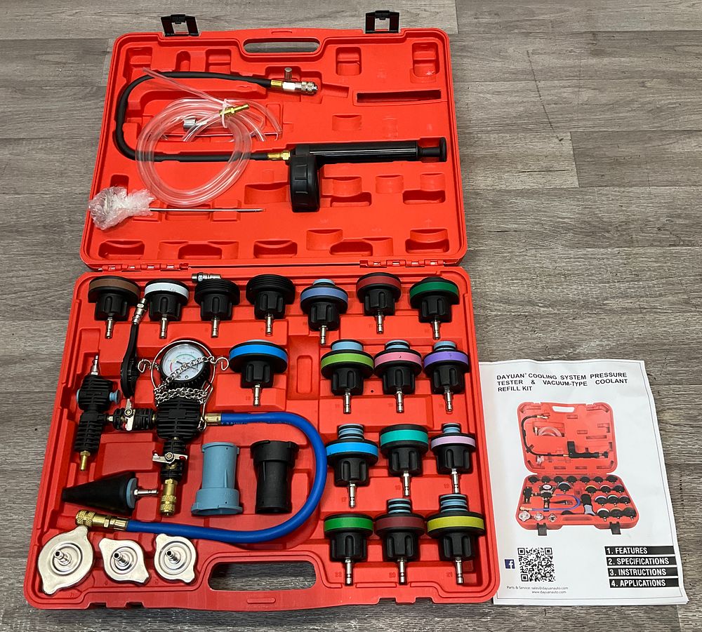 Lot 55: * A Dayuan Cooling System Pressure Tester & Vacuum-Type Coolant Refill Kit in a Red Case