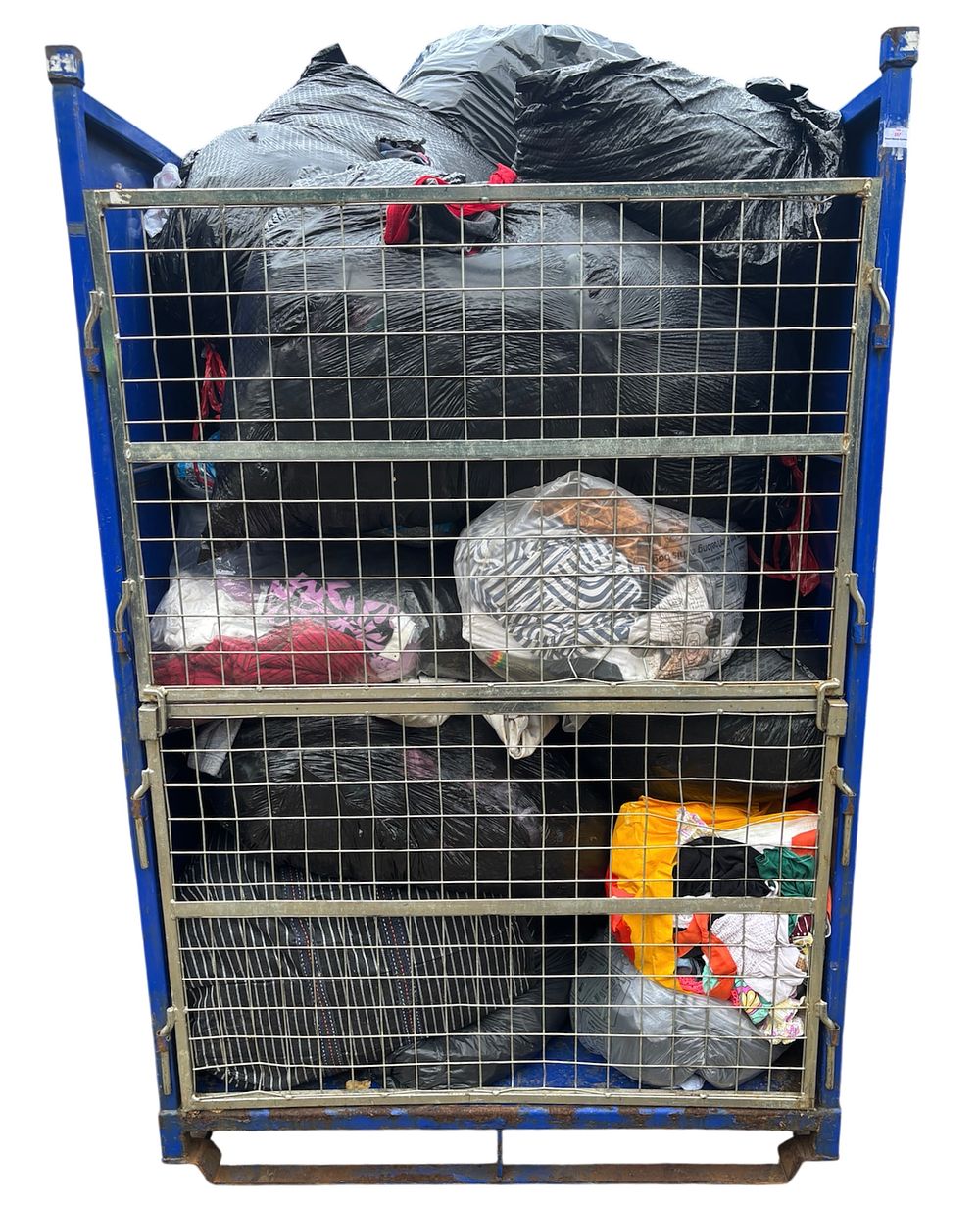 Lot 98: * A Metal Stillage Containing An Assortment of Clothing and Footwear - METAL STILLAGE NOT INCLUDED