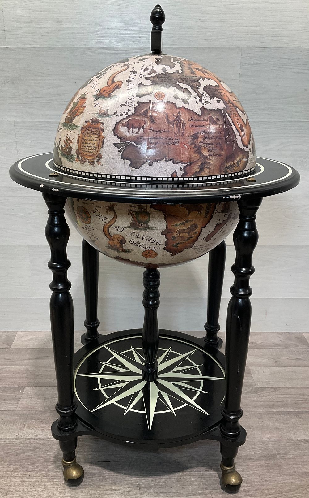 Lot 139: * A Floor Standing Globe Bar Cabinet with Mythological Interior Scene