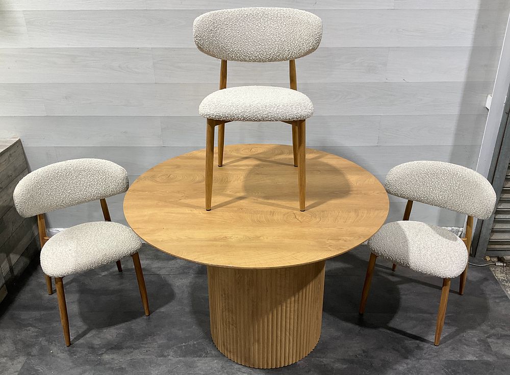 Lot 146: * A Pedestal Dining Table and A Set of Three Chairs